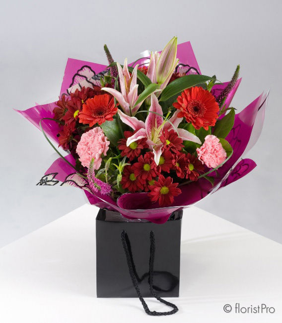 Beautiful lily in  the pink hand tied arrangement